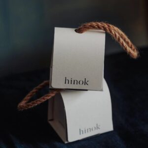 Eco-friendly flip-top paper box with natural rope handle for premium product packaging