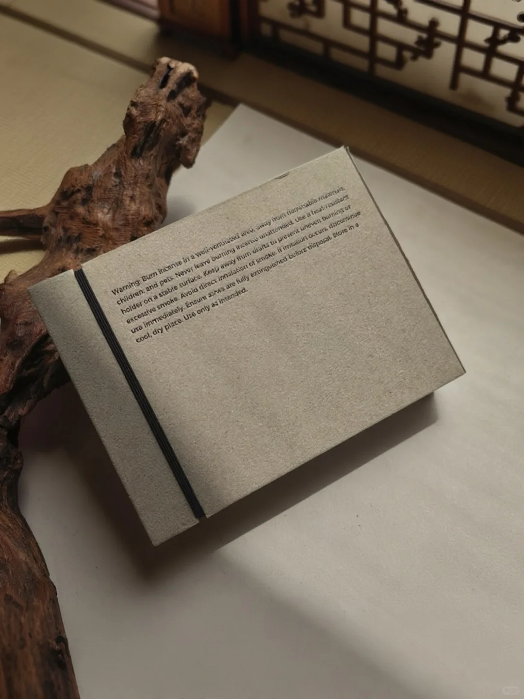 Grey board book style box packaging for premium products