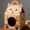 Creative kraft paper gift box with die-cut cartoon design, eco-friendly packaging solution
