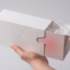Luxury drawer gift box with embossed surface and sliding pull out design