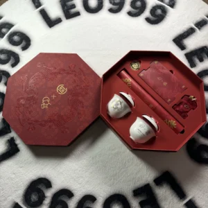 Luxury red octagon tea gift box packaging with rigid structure and custom insert tray