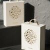 Luxury book style magnetic gift packaging box with handle and floral cutout design